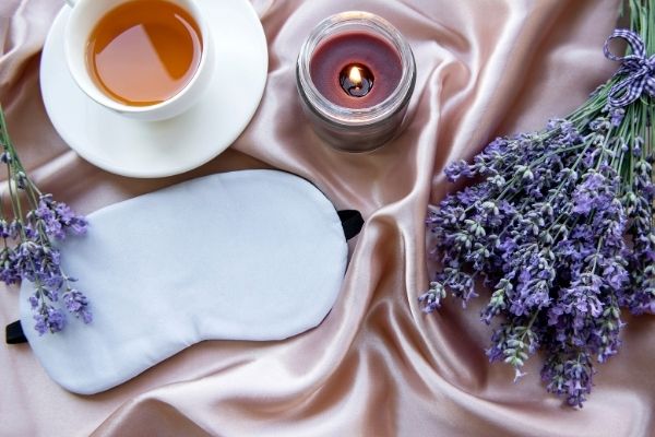 natural sleep aids, candle, sleep mask, lavender, tea