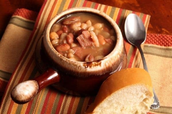 Easy Instant Pot Hurst Bean Soup Recipe in brown bowl