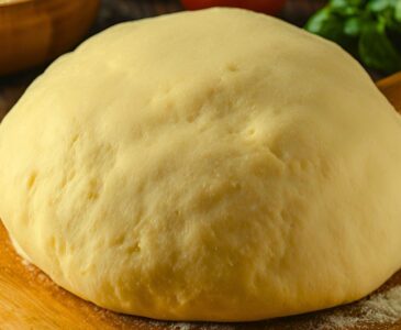 ball of pizza dough made from einkorn pizza dough recipe