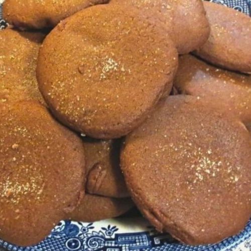 old fashioned molasses cookies on a blue willow plate