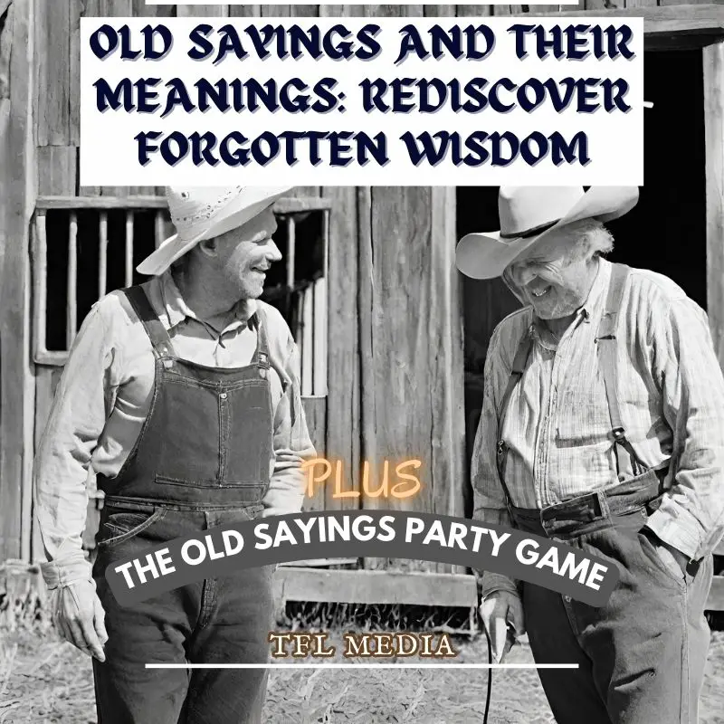 two old farmers in front of an old barn laughing