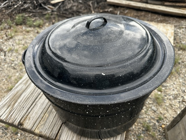 Water bath canner pot of black enamel, one of our favorite methods to preserve food.