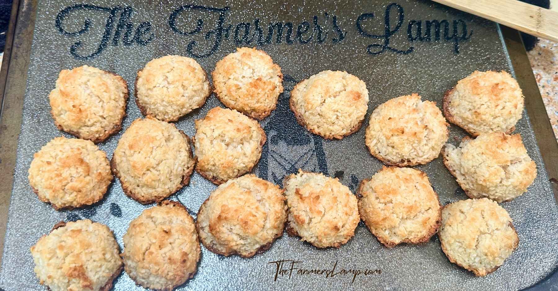 16 gluten free coconut macaroons baked on a glass cutting board with The Farmer's Lamp lettering.