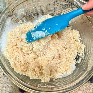 Egg whites being folded into coconut mixture